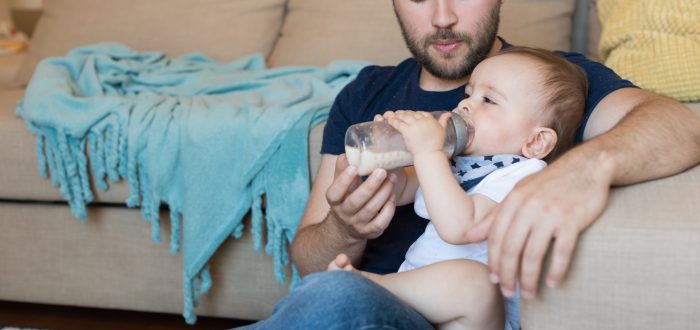 Father feeding baby